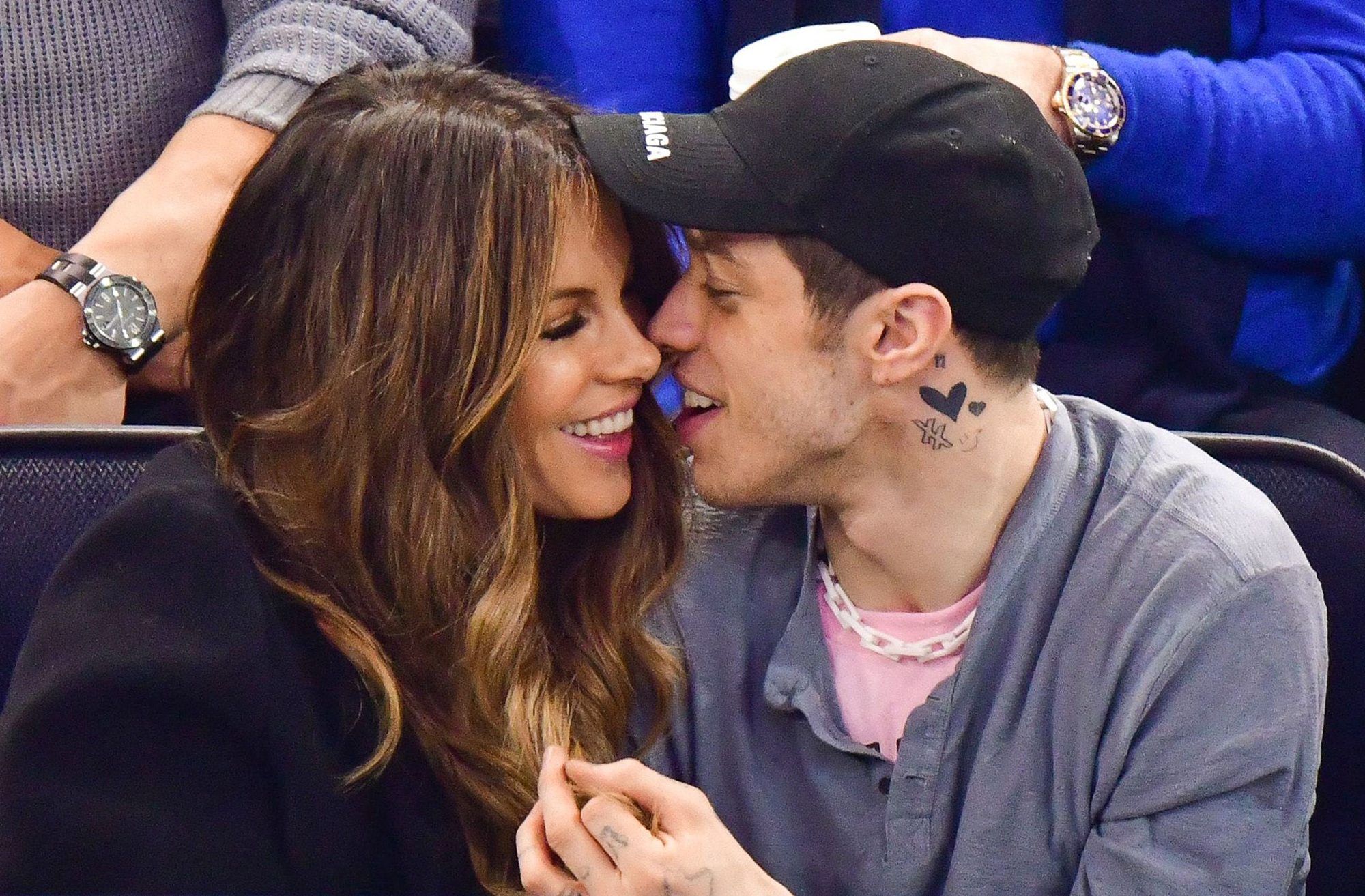 Kate Beckinsale and Pete Davidson showing PDA